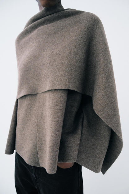 Elegant mjuk capejacka för damer