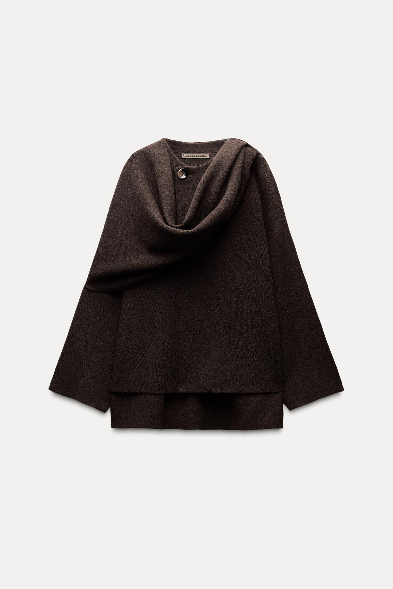 Elegant mjuk capejacka för damer