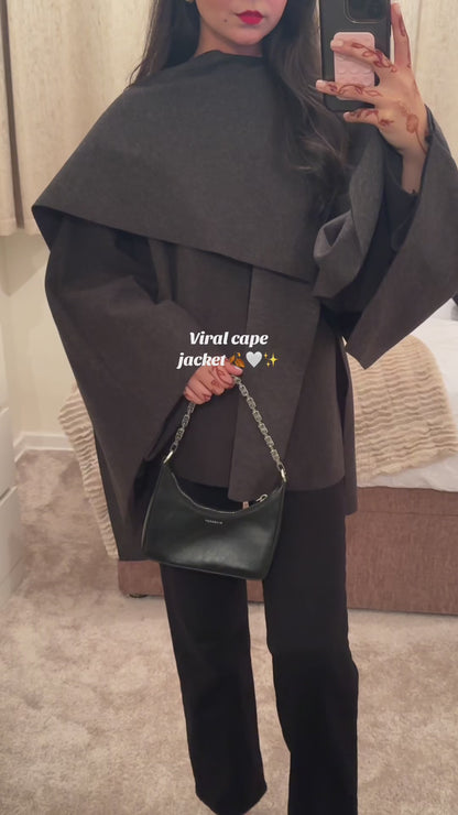 Elegant mjuk capejacka för damer