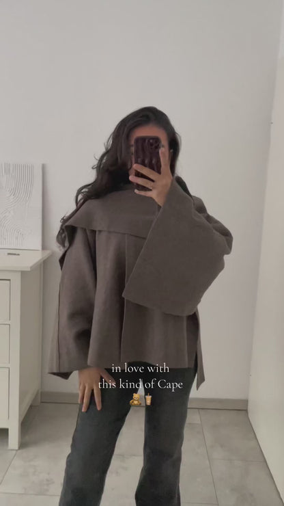 Elegant mjuk capejacka för damer